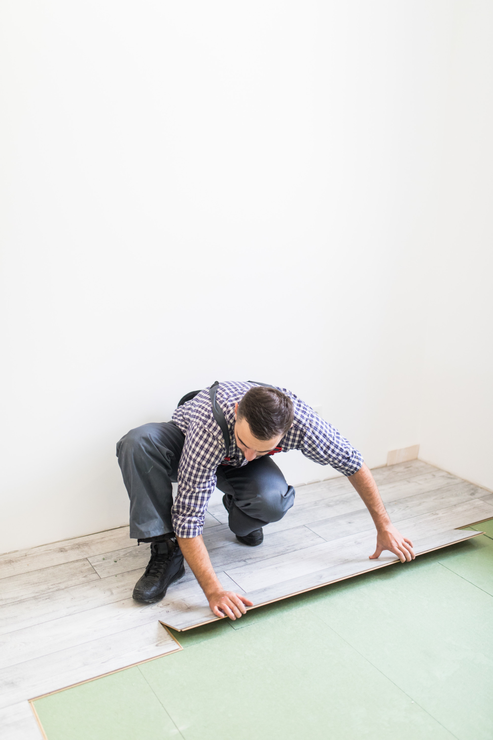 Professional flooring installation during home remodeling project