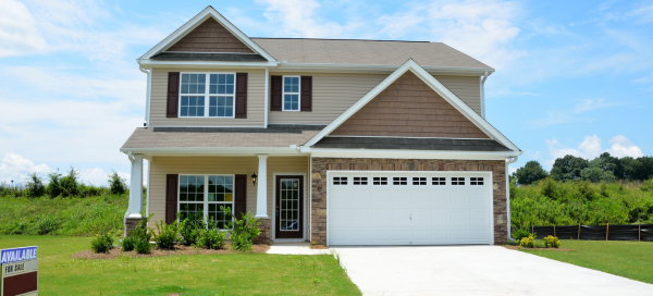 Two-story modular home with traditional colonial exterior on a Maryland lot.